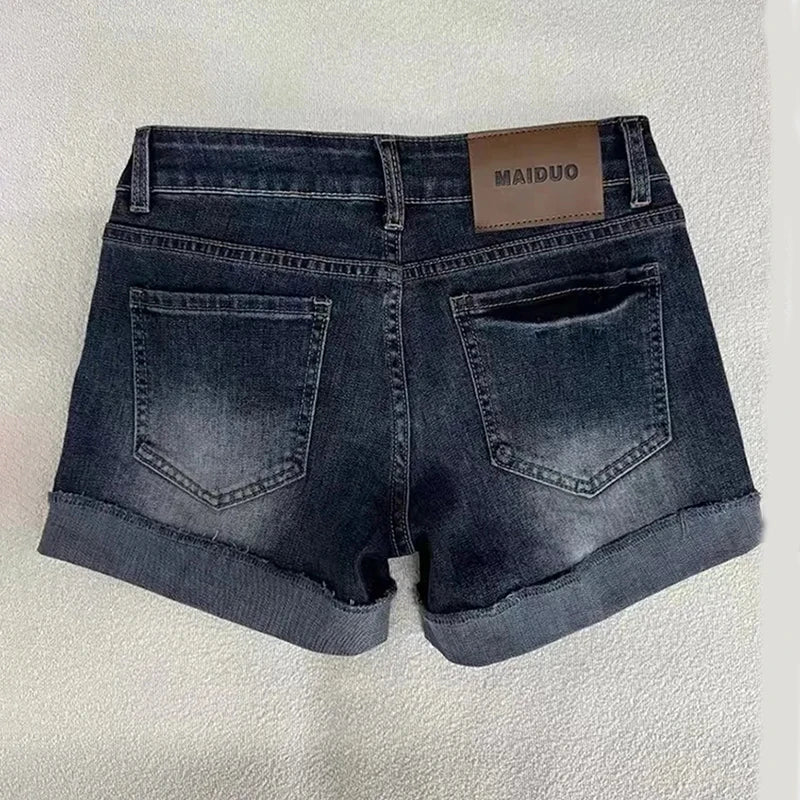 Low Rise Deep Blue Distressed Denim Shorts with Roll-Up Hem
